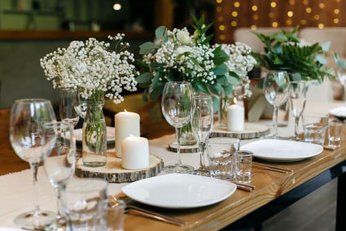 Wedding,In,Rustic,Style.,Wooden,Tables,,Gypsophila,And,Greenery,,Candles.